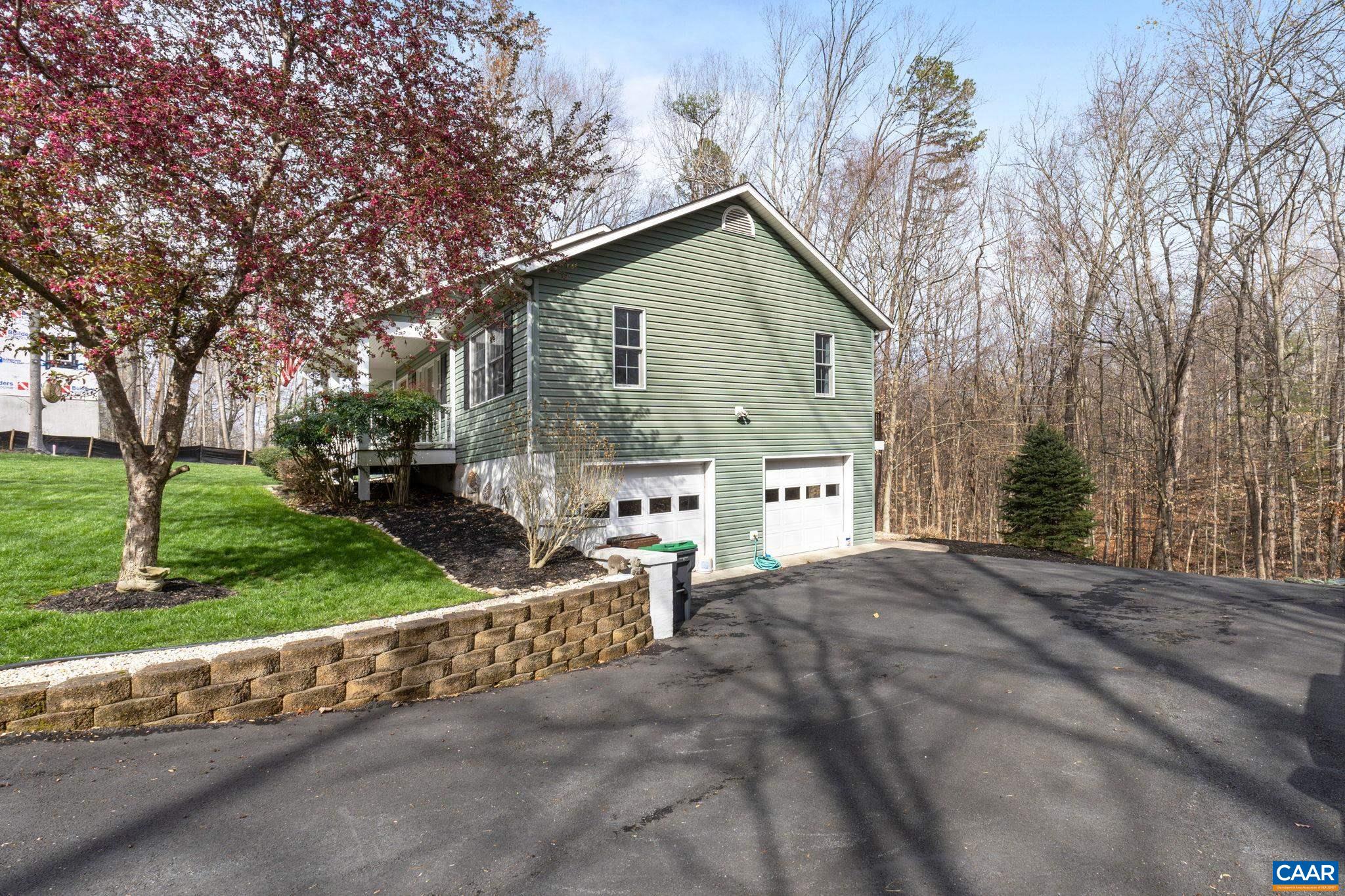 22 Riverside Drive Palmyra, VA 22963 - Photo 28 of 40 a view of a house with a yard and large tree