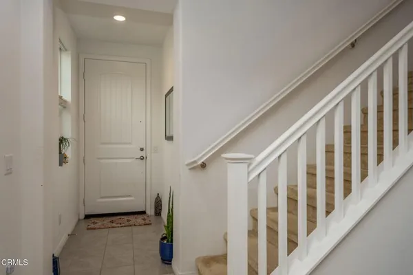 a view of an entryway with staircase