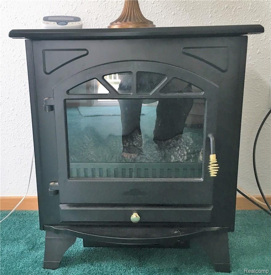 10077 Beers Road Swartz Creek, MI 48473 - Photo 13 of 26 ELECTRIC HEATER IN FAMILY ROOM