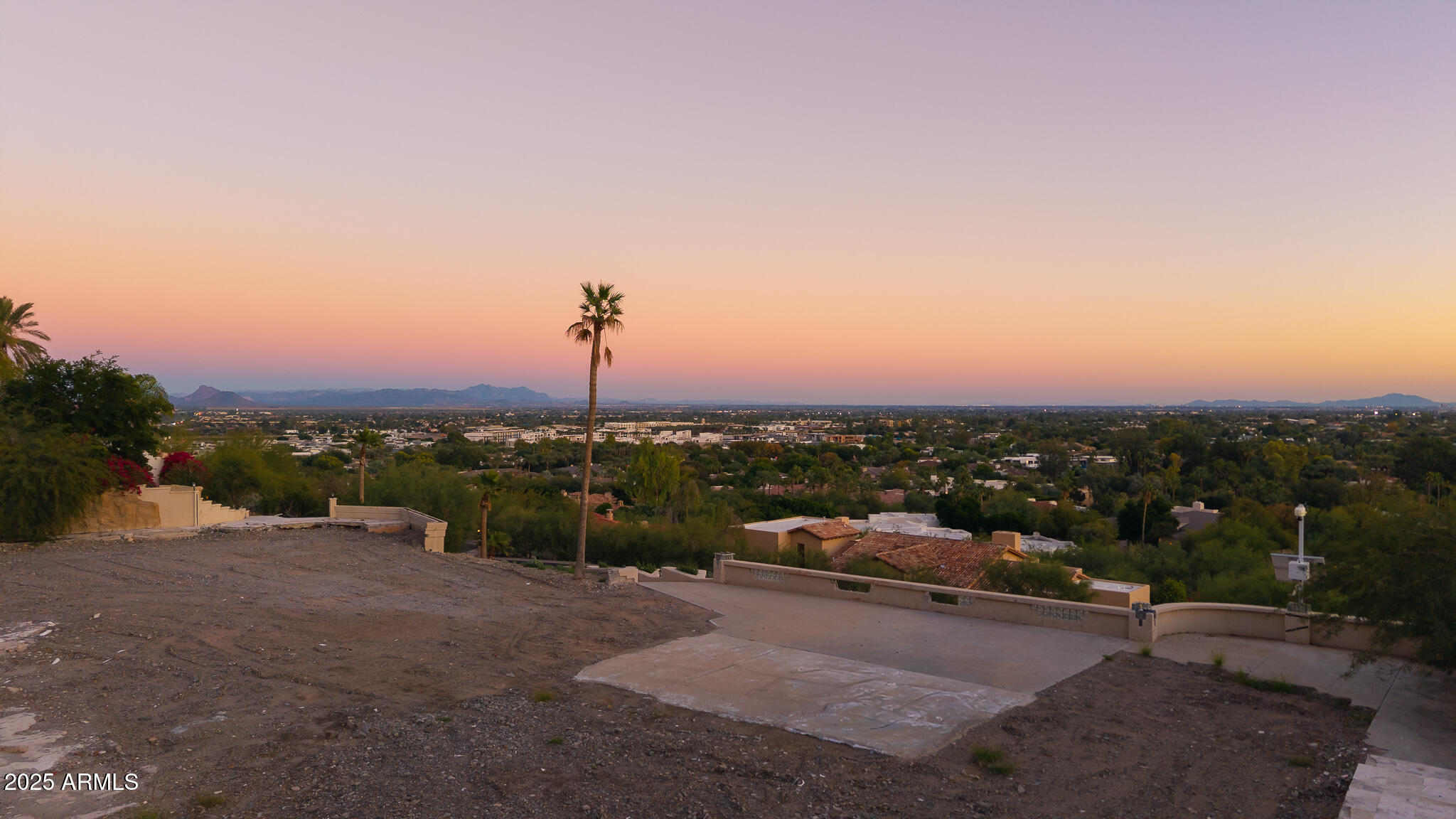 6418 East Joshua Tree Lane, Unit 2 Paradise Valley, AZ 85253 - Photo 6 of 8 a view of a terrace with a bench