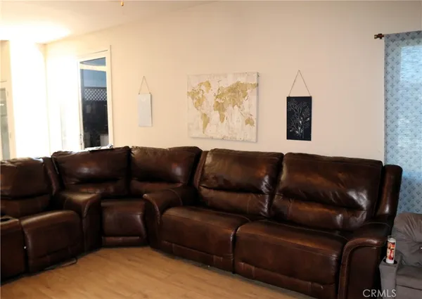 a living room with a couch and a flat screen tv