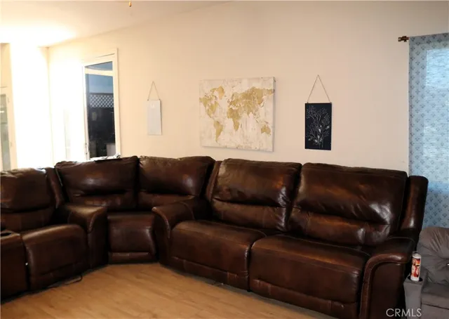 a living room with a couch and a flat screen tv