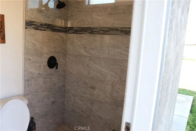 a view of a swimming pool with a lounge chairs