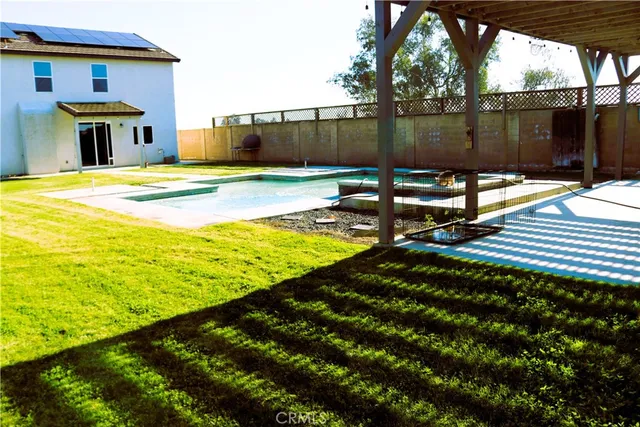 a view of swimming pool with garden