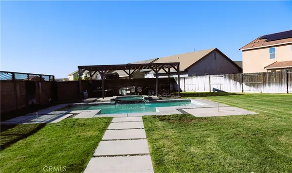 a house view with a garden space