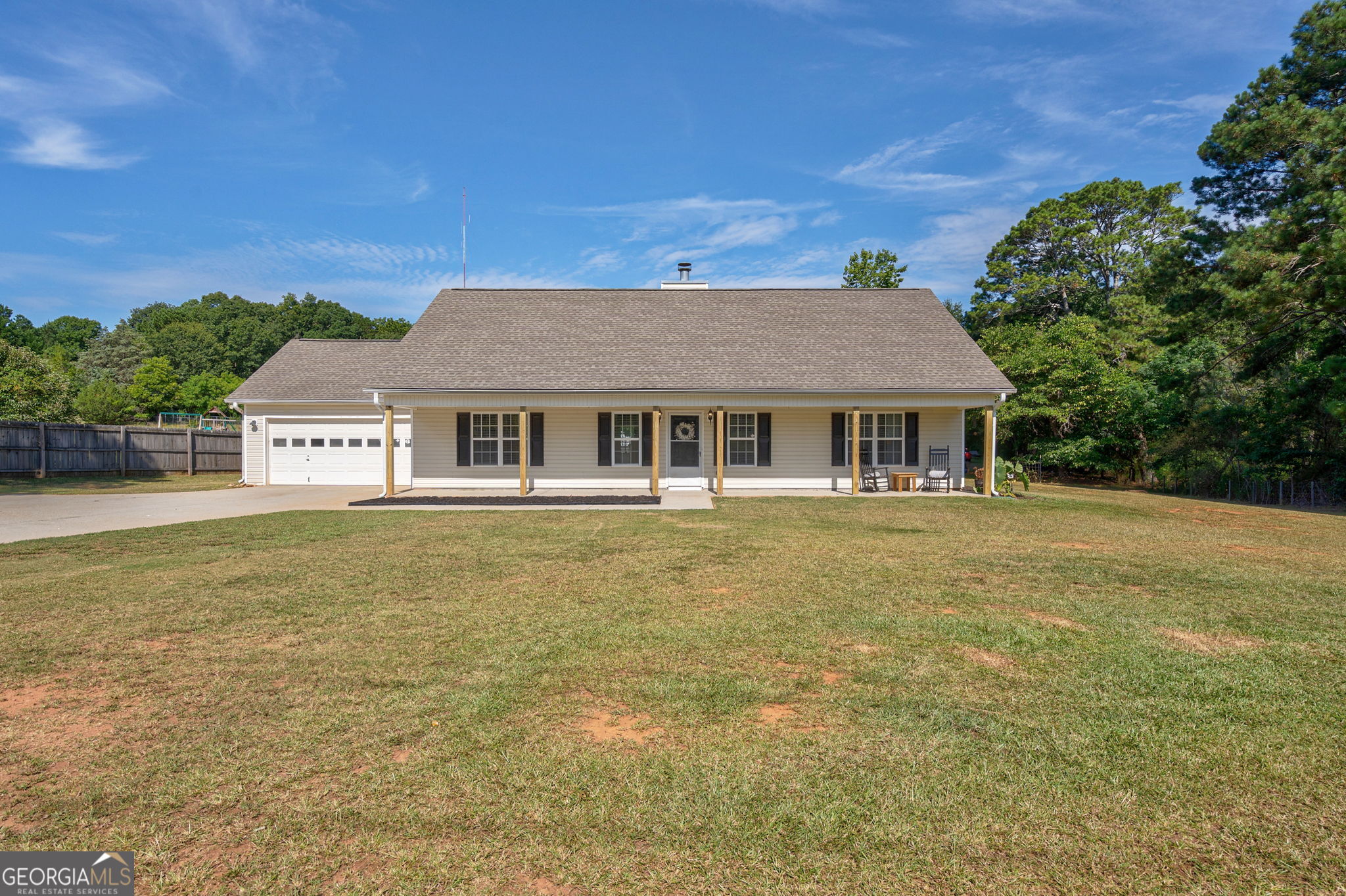 1670 Gratis Road Monroe, GA 30656 - Photo 1 of 1 a front view of a house with a garden