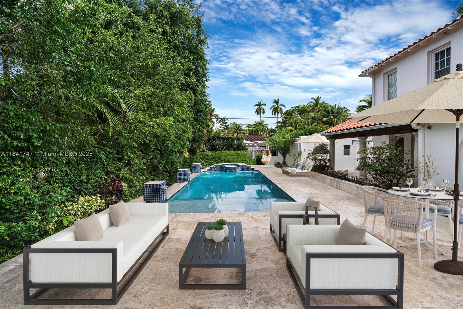 671 Northeast 57th Street Miami, FL 33137 - Photo 32 of 48 swimming pool view with a seating space