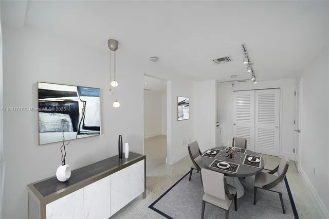 a view of a dining room with furniture