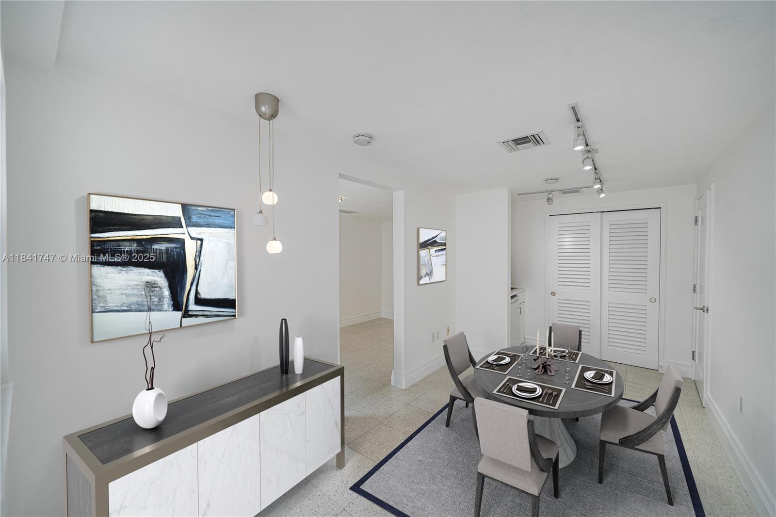 671 Northeast 57th Street Miami, FL 33137 - Photo 36 of 48 a view of a dining room with furniture