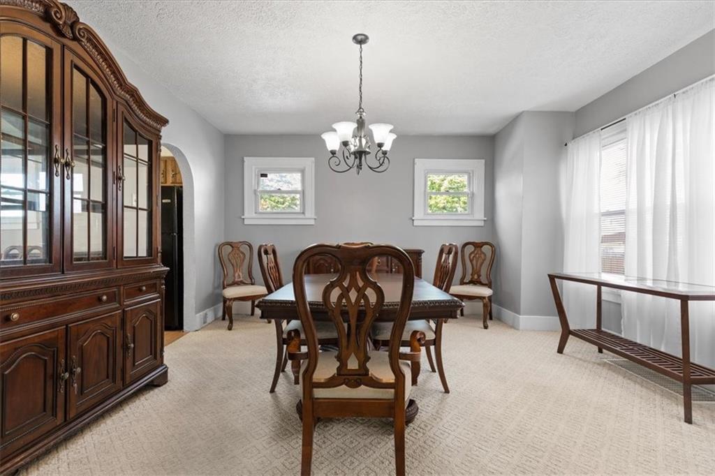 450 Irvin Avenue Rochester, PA 15074 - Photo 11 of 30 a view of a dining room with furniture window and outside view