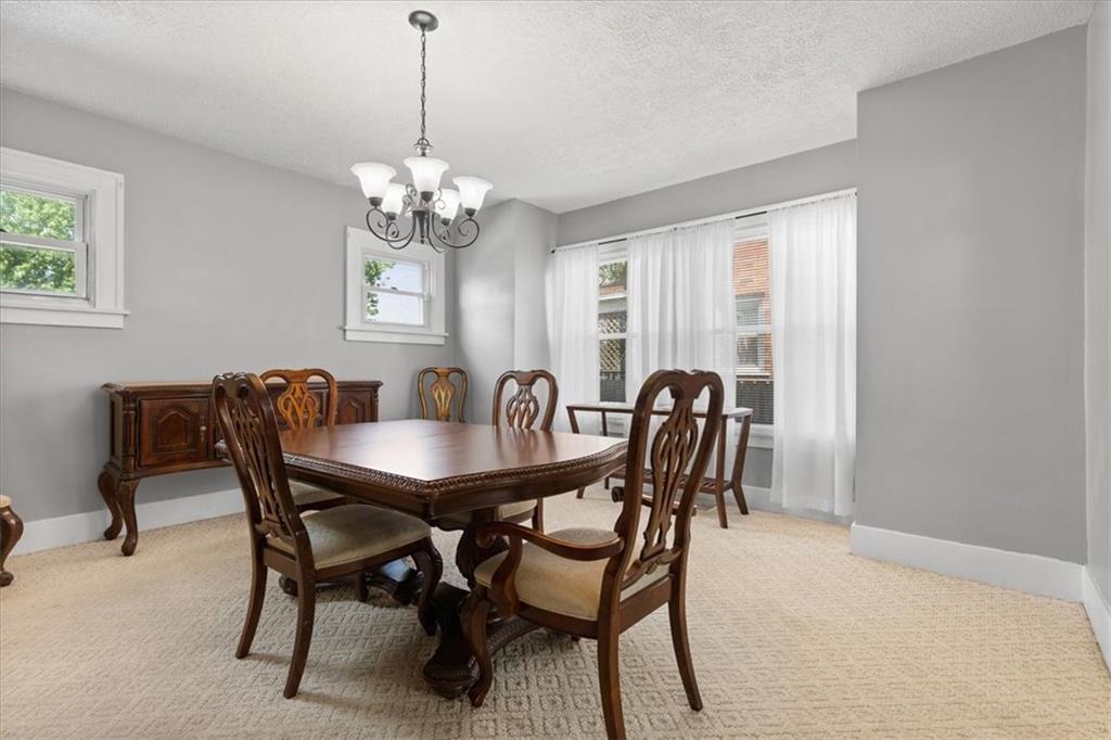 450 Irvin Avenue Rochester, PA 15074 - Photo 12 of 30 a view of a dining room with furniture window and outside view