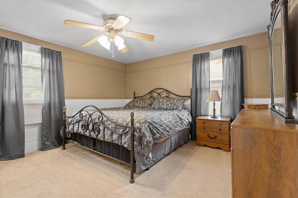 450 Irvin Avenue Rochester, PA 15074 - Photo 19 of 30 a bedroom with a bed and window