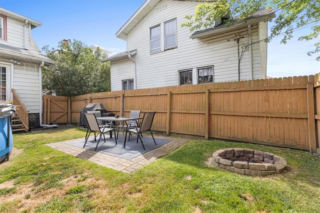 450 Irvin Avenue Rochester, PA 15074 - Photo 28 of 30 a view of a backyard with table and chairs