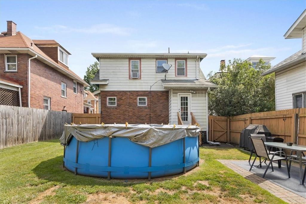 450 Irvin Avenue Rochester, PA 15074 - Photo 29 of 30 a view of a backyard with table and chairs