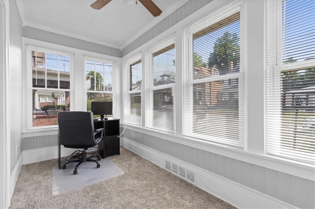 450 Irvin Avenue Rochester, PA 15074 - Photo 9 of 30 a view of a workspace with furniture and a window