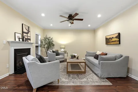 a spacious bedroom with a bed and a lamp
