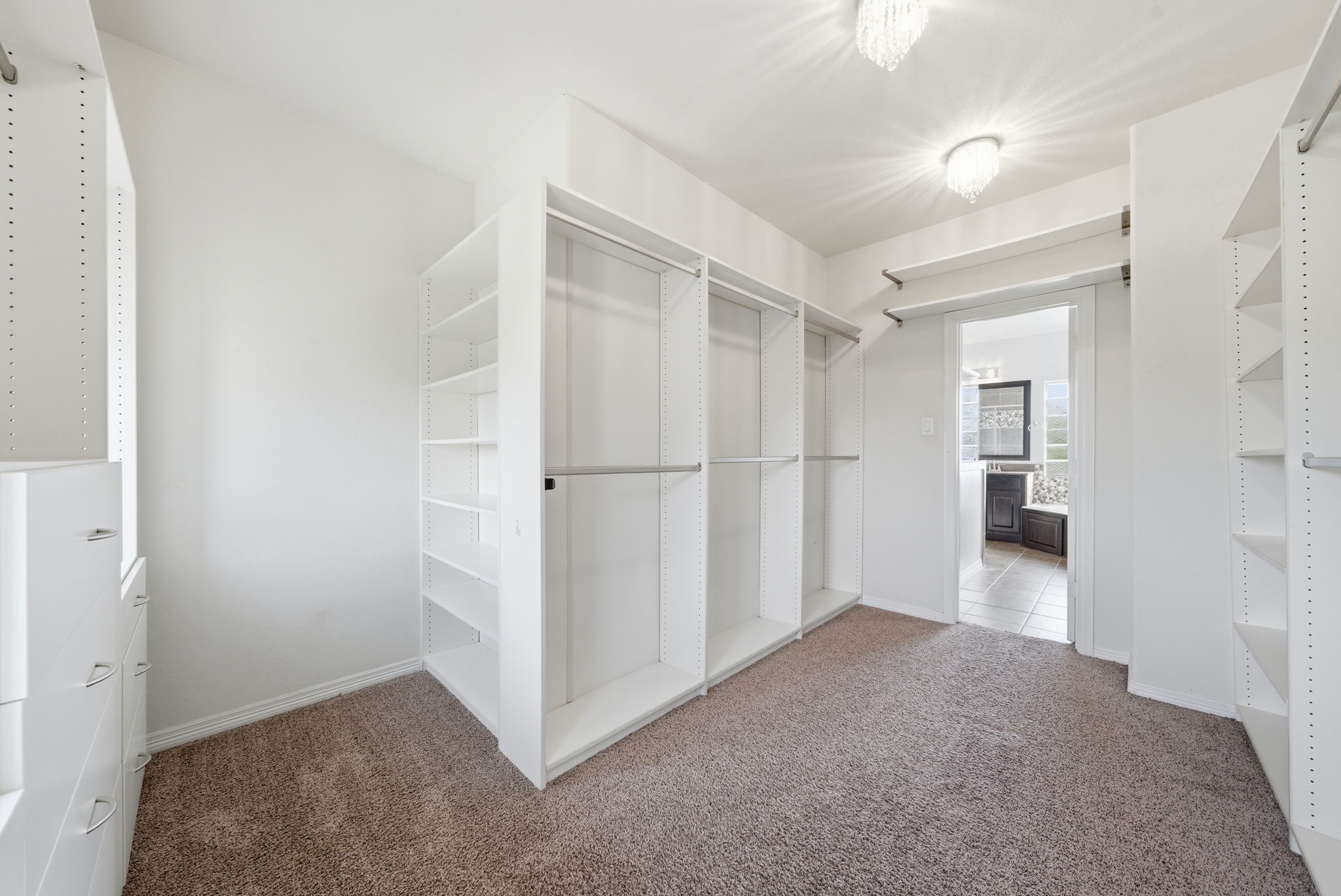 10218 Spring Shadows Park Circle Houston, TX 77080 - Photo 33 of 46 a view of a hallway to rooms