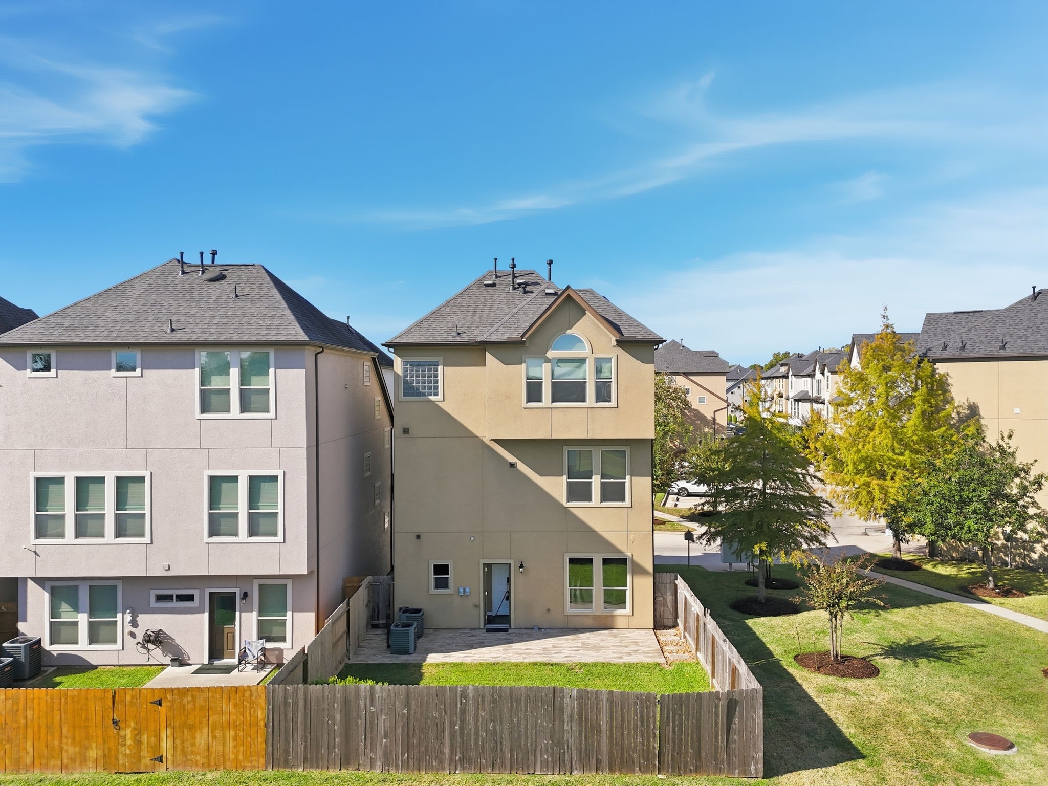 10218 Spring Shadows Park Circle Houston, TX 77080 - Photo 40 of 46 a front view of a house with a yard