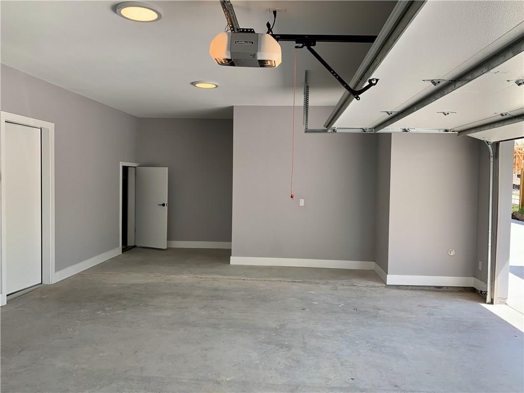 2117 Pershing Drive Austin, TX 78723 - Photo 21 of 30 EXTRA LARGE Garage! Lots of room to add shelving and huge storage.