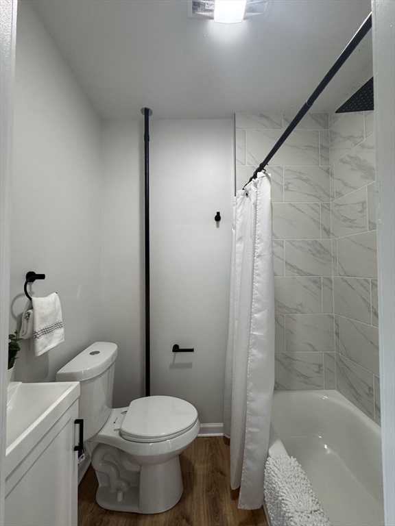 48 Santa Barbara Street Springfield, MA 01104 - Photo 15 of 33 a bathroom with a toilet and a shower
