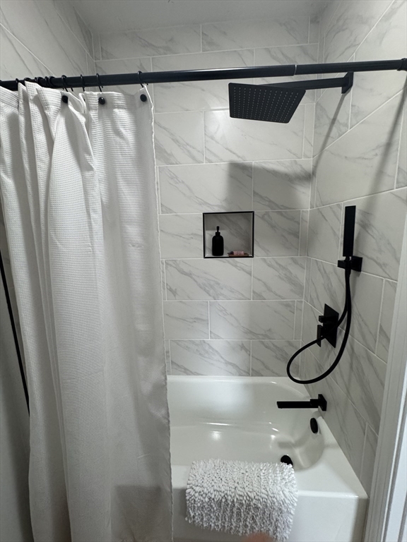 48 Santa Barbara Street Springfield, MA 01104 - Photo 16 of 33 a bathroom with a shower