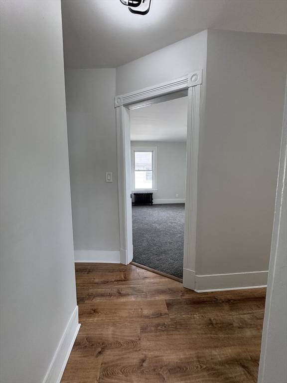 48 Santa Barbara Street Springfield, MA 01104 - Photo 19 of 33 a view of a room with wooden floor