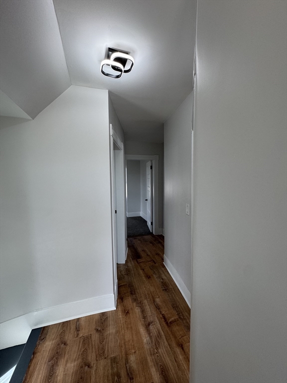 48 Santa Barbara Street Springfield, MA 01104 - Photo 21 of 33 a view of hallway with wooden floor