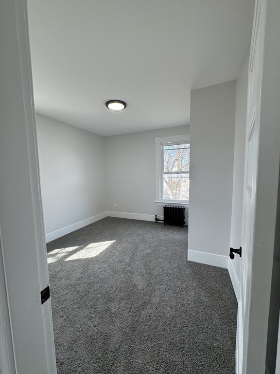 48 Santa Barbara Street Springfield, MA 01104 - Photo 27 of 33 an empty room with a window and closet area