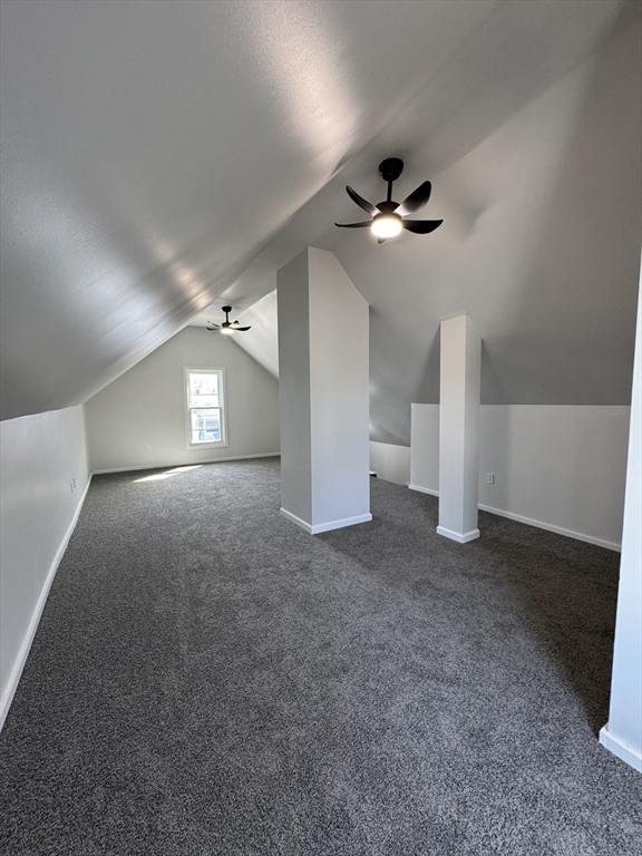 48 Santa Barbara Street Springfield, MA 01104 - Photo 30 of 33 a view of a livingroom with a ceiling fan and window
