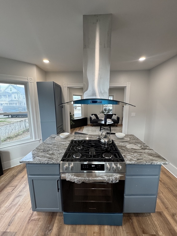 48 Santa Barbara Street Springfield, MA 01104 - Photo 10 of 33 a kitchen with stainless steel appliances granite countertop a stove and a refrigerator
