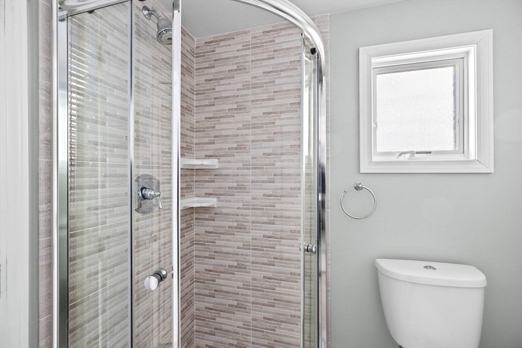 75 Rebecca Road Scituate, MA 02066 - Photo 11 of 42 a bathroom with a toilet and a shower
