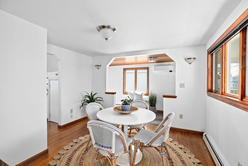 75 Rebecca Road Scituate, MA 02066 - Photo 12 of 42 a dining room with furniture window and wooden floor