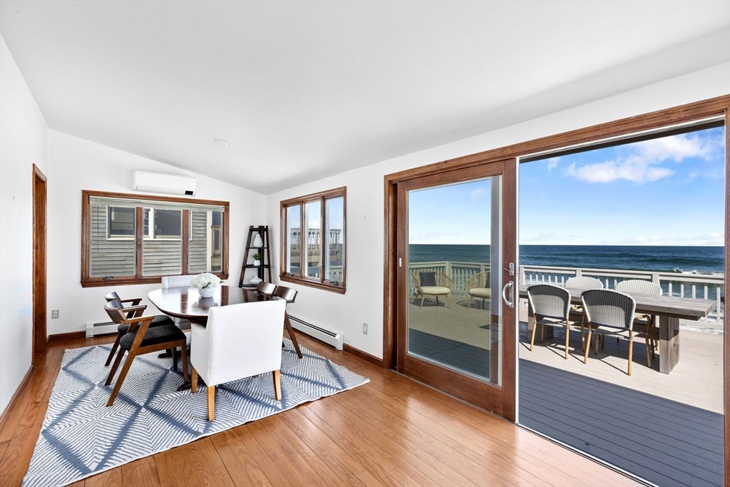 75 Rebecca Road Scituate, MA 02066 - Photo 22 of 42 a workspace with wooden floor and a large window