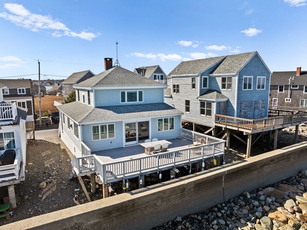 75 Rebecca Road Scituate, MA 02066 - Photo 36 of 42 a view of a large building with a lot of windows