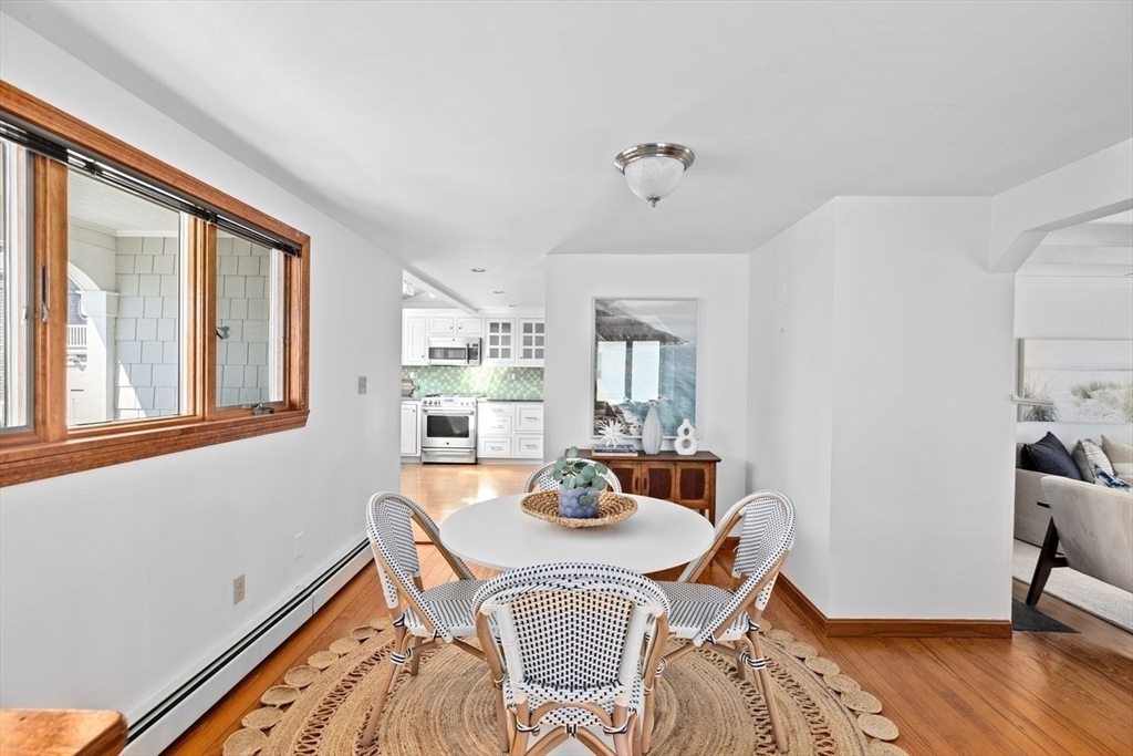 75 Rebecca Road Scituate, MA 02066 - Photo 5 of 42 a view of a dining room with furniture window and wooden floor