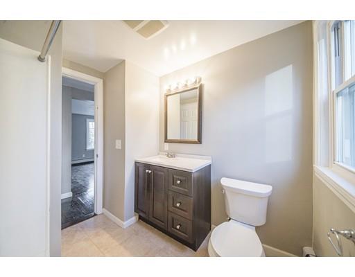 37 Sunrise Terrace Springfield, MA 01119 - Photo 11 of 27 a bathroom with a toilet sink and mirror