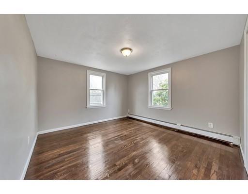 37 Sunrise Terrace Springfield, MA 01119 - Photo 12 of 27 a view of an empty room with wooden floor and a window
