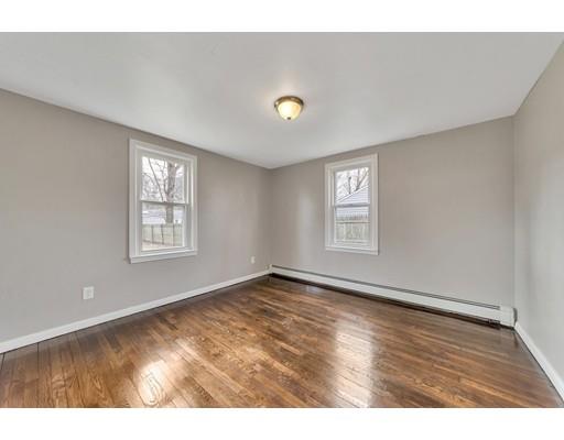 37 Sunrise Terrace Springfield, MA 01119 - Photo 13 of 27 a view of an empty room with window and wooden floor