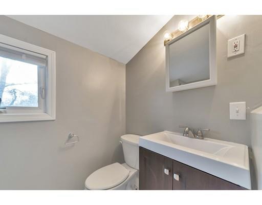 37 Sunrise Terrace Springfield, MA 01119 - Photo 15 of 27 a bathroom with a sink vanity mirror and toilet