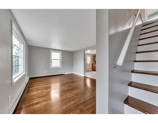 37 Sunrise Terrace Springfield, MA 01119 - Photo 5 of 27 a view of an empty room with wooden floor and stairs