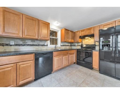 37 Sunrise Terrace Springfield, MA 01119 - Photo 8 of 27 a kitchen with stainless steel appliances granite countertop a stove a sink dishwasher and a refrigerator