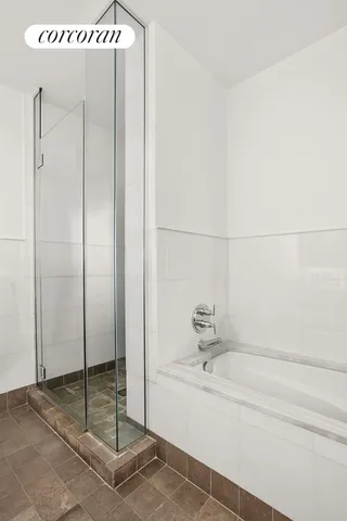 a bathroom with 2 sink and a mirror