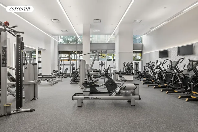 a view of a bathroom with sink and mirror