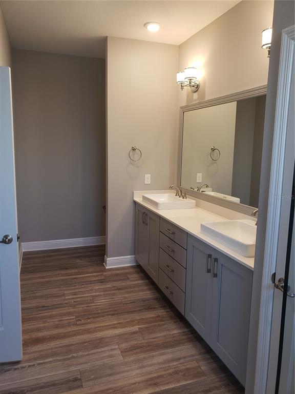 9013 Southwest 79th Lane Ocala, FL 34481 - Photo 14 of 21 a bathroom with a sink and a mirror