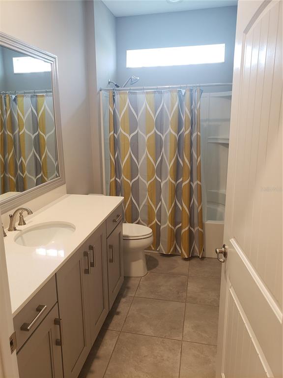 9013 Southwest 79th Lane Ocala, FL 34481 - Photo 17 of 21 a bathroom with a sink and a mirror