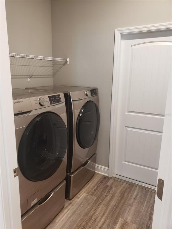 9013 Southwest 79th Lane Ocala, FL 34481 - Photo 18 of 21 a utility room with dryer and washer