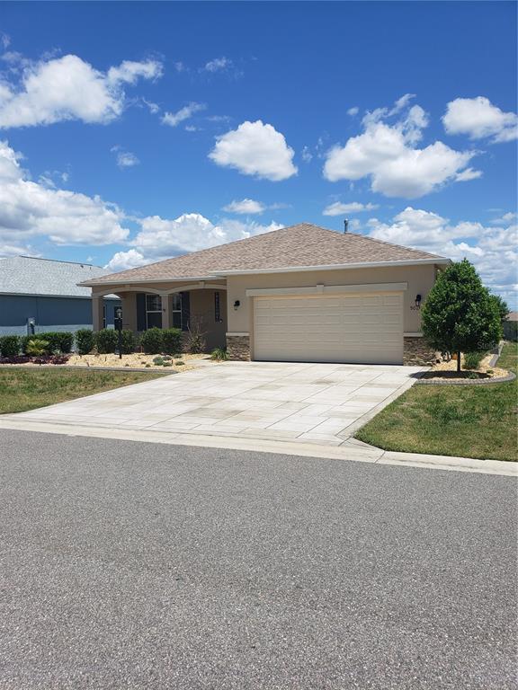 9013 Southwest 79th Lane Ocala, FL 34481 - Photo 2 of 21 a view of swimming pool is middle in front of the house