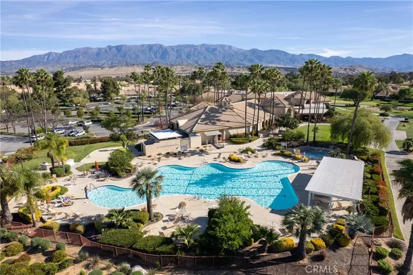 an aerial view of residential houses and outdoor space