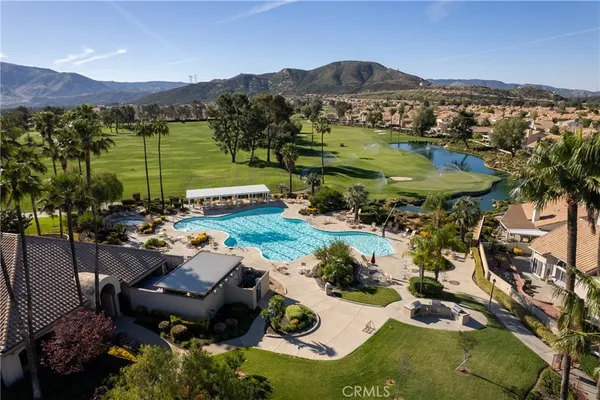 an aerial view of a house with outdoor space