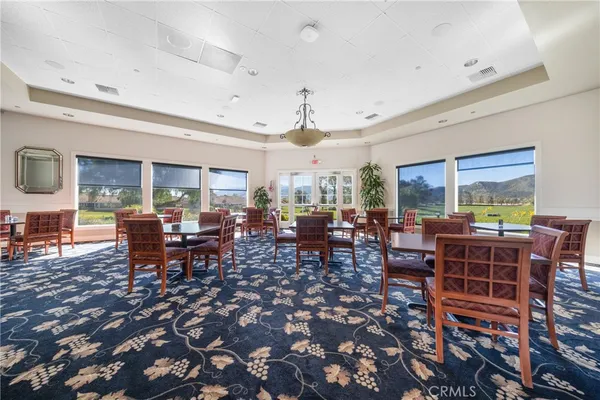an aerial view of a house with mountain view